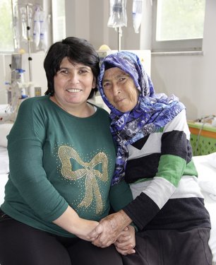Mother and daughter in dialysis centre
