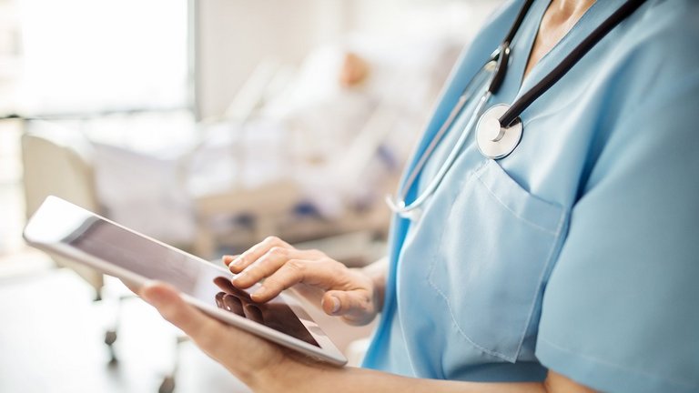 Nurse holding tablet