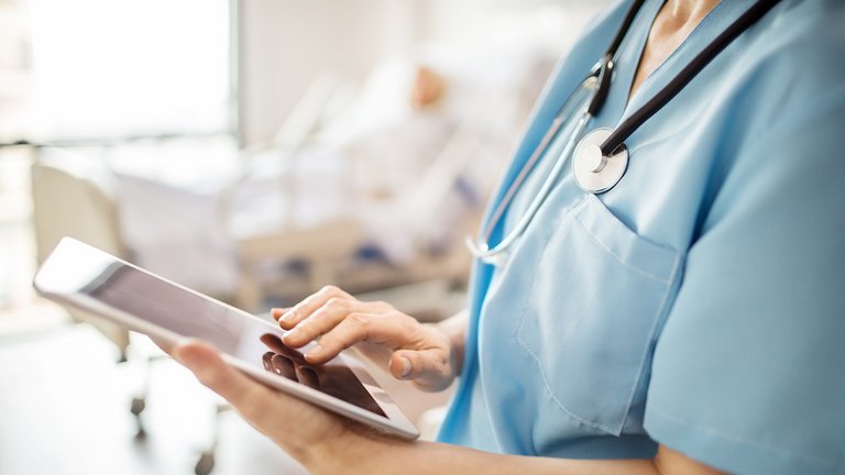 Nurse holding tablet