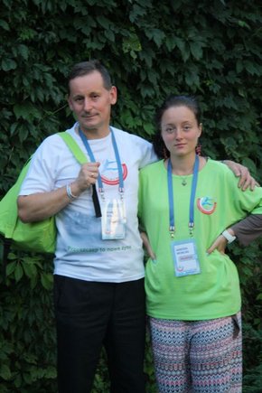 Male patient and his daughter volunteering