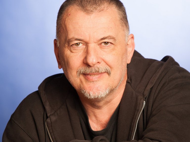 Male patient sitting on a chair