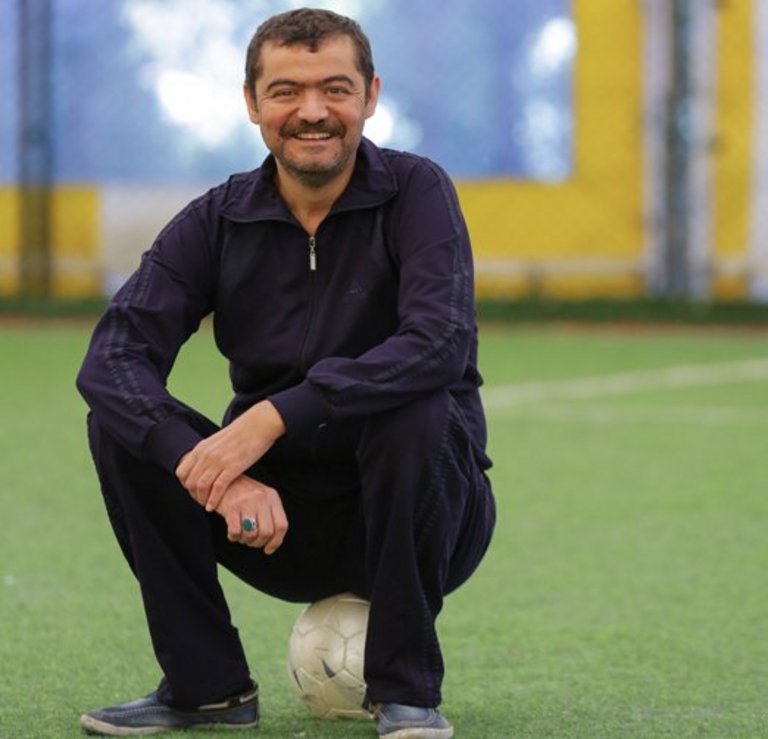 male HHD patient on the football field